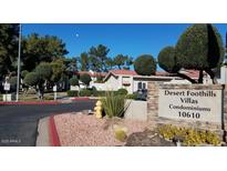 Desert Foothills Villas features beautiful landscaping, inviting entrance, and well-maintained grounds at 10610 S 48Th St # 1074, Phoenix, AZ 85044