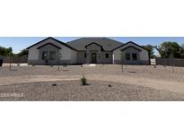 Charming single-story home with a desert landscaped front yard and modern design at 3989 E Freeman Ln, San Tan Valley, AZ 85140