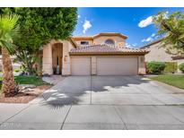 Charming home with a well-maintained front yard, large shade trees, and a spacious three-car garage at 514 E Yvonne Ln, Tempe, AZ 85284