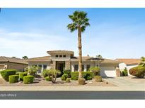 Beautiful single-story home with desert landscaping, a tiled roof, and an attached two-car garage at 5122 S Miller Pl, Chandler, AZ 85249