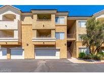 Inviting condo featuring balconies, garage, and convenient stair access to upper units at 18416 N Cave Creek Rd # 3034, Phoenix, AZ 85032