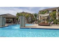 Beautiful community pool with luxurious cabana and water features at 18416 N Cave Creek Rd # 3034, Phoenix, AZ 85032