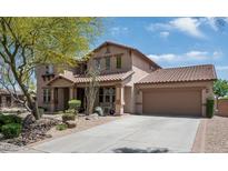 Stunning two-story home with a spacious two car garage and beautiful desert landscaping at 2307 W Sienna Bouquet Pl, Phoenix, AZ 85085