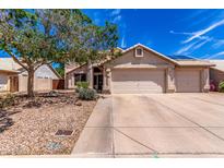 Charming single-story home featuring a low maintenance front yard and a two car garage at 1631 N Avoca --, Mesa, AZ 85207