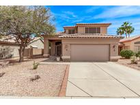 Beautiful single Gathering house with front lawn landscaping, a two car garage, and a desert feel at 4757 E Goldfinch Gate Ln, Phoenix, AZ 85044