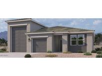 A charming single-Gathering home features a two-car garage, neutral color palette and well manicured desert landscaping at 47230 W Cansados Rd, Maricopa, AZ 85139