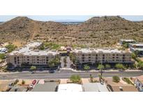 Inviting condo community with desert landscaping and mountain views at 9820 N Central Ave # 307, Phoenix, AZ 85020