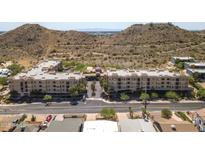 Beautiful condo complex with mountain views and well-maintained landscaping, and secure covered parking at 9820 N Central Ave # 324, Phoenix, AZ 85020