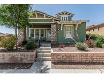 Charming two-story home with stone accents and well-maintained landscaping at 4396 N School Hill Rd, Buckeye, AZ 85396