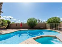Refreshing pool with a relaxing spa, perfect for enjoying sunny days and outdoor living at 1207 E Clearview Dr, Casa Grande, AZ 85122