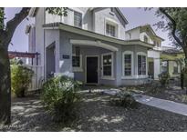 Inviting covered front porch with stylish architectural details and a welcoming entrance at 3065 E Tamarisk St, Gilbert, AZ 85296