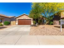 Charming single-story home with desert landscaping and a well-maintained front yard at 43303 N 44Th Ave, New River, AZ 85087