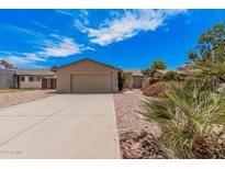 Charming single-story home with a two-car garage and well-maintained landscaping at 5237 W Mountain View Rd, Glendale, AZ 85302
