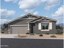 Charming single-story home featuring a two-car garage, neutral paint, and decorative stone accents at 24113 W Bowker St, Buckeye, AZ 85326