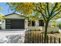 Beautiful single Gathering home with a well manicured yard and a modern curb appeal at 4817 N 35Th St, Phoenix, AZ 85018