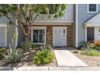 Charming townhouse with well-maintained landscaping and inviting front entrance at 1601 N Saba St # 308, Chandler, AZ 85225