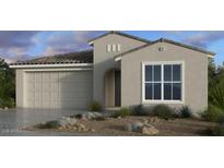 Charming single-story home featuring neutral tones, tile roofing and low-maintenance desert landscaping at 16932 W Desert Hollow Dr, Surprise, AZ 85387