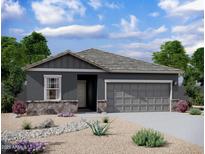 Charming single-story home featuring a two-car garage, stone accents, and low maintenance desert landscaping at 2025 E Bucking Bronco Dr, San Tan Valley, AZ 85140