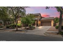 Charming home with a stone facade, manicured landscaping, and a two-car garage perfect for suburban living at 21014 W Cora Vista --, Buckeye, AZ 85396