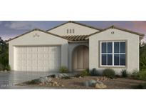 Inviting single story home featuring a two-car garage, neutral color scheme and well-manicured landscaping at 25160 N 171St Ln, Surprise, AZ 85387