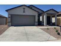 Beautiful single-story home with a two-car garage and a well-manicured, low-maintenance front yard at 3936 E San Jose St, San Tan Valley, AZ 85143