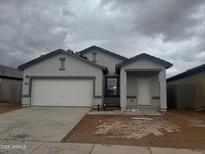 Charming single-story home with a two-car garage and low-maintenance front yard at 3936 E San Jose St, San Tan Valley, AZ 85143
