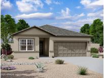 Charming single-story home with a two-car garage and a low maintenance desert landscaped front yard at 4227 E Kolin Ln, San Tan Valley, AZ 85143