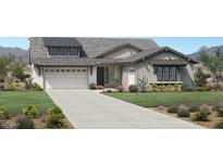 Charming single-Gathering home with a two-car garage and welcoming curb appeal on a sunny day at 24088 S 218Th Pl, Queen Creek, AZ 85142
