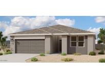 Charming single-story home featuring a two-car garage, neutral paint, and desert landscaping at 46904 W Coe St, Maricopa, AZ 85139