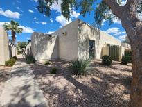 Inviting single-story home featuring desert landscaping and a walkway to the front door at 520 S Evergreen Rd, Tempe, AZ 85288