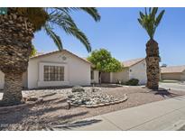 Charming single-story home featuring desert landscaping and a welcoming facade on a sunny day at 843 E Vera Ln, Tempe, AZ 85284
