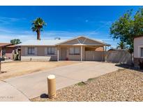 Cozy single-story home with a well-maintained front yard and private driveway at 4636 W Mission Ln, Glendale, AZ 85302