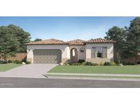 Charming one-story home showcasing desert landscaping, an attached two-car garage, and a beautiful tile roof at 16934 W Bronco Trl, Surprise, AZ 85387