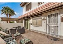 Inviting patio area with stylish outdoor furniture, ideal for relaxation and entertainment at 1916 W Morningside Dr # 108, Phoenix, AZ 85023