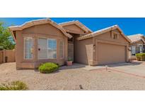 Charming single-story home with a low-maintenance desert landscape and a neutral color palette at 2247 E Ross Ave, Phoenix, AZ 85024