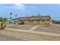 Charming single-story home featuring a well-maintained landscape and inviting curb appeal at 2617 N 40Th Ave, Phoenix, AZ 85009