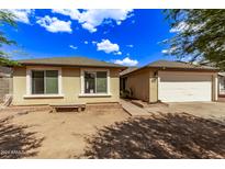 Inviting single-Gathering home with a well-maintained exterior, a two-car garage, and desert landscaping at 4629 N 78Th Dr, Phoenix, AZ 85033