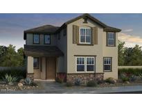 Charming two-story home featuring a stylish facade and well-manicured landscaping, creating great curb appeal at 9964 W Piccadilly Rd, Avondale, AZ 85392