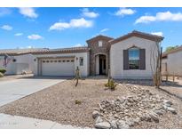 Charming single-story home with stone accents, desert landscaping, and a two-car garage at 5312 S Citrus Ct, Gilbert, AZ 85298