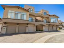 Beautiful condo building exterior showing multi-level patios and attached garages at 2019 E Campbell Ave # 110, Phoenix, AZ 85016