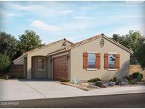 Charming single-story home featuring desert landscaping, a two-car garage, and a classic Southwestern architectural style at 310 S San Christo Ln, Casa Grande, AZ 85194