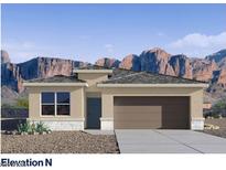 Charming single-story home featuring a two-car garage and mountain views at 4940 S 106Th Ln, Tolleson, AZ 85353