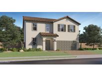 Charming two-story home features a tile roof, a two-car garage, and a well-maintained lawn at 9544 W Pinchot Ave, Phoenix, AZ 85037
