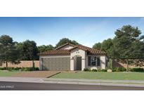 Charming single-story home with a two-car garage, tile roof, and well-manicured lawn at 9833 W Avalon Dr, Phoenix, AZ 85037