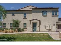 Charming stucco townhouse with desert landscaping and a private entrance at 14870 W Encanto Blvd # 2123, Goodyear, AZ 85395