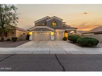 Beautiful two-story home featuring a three-car garage and well-manicured landscaping at 3634 S Danielson Way, Chandler, AZ 85286