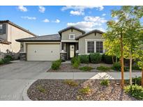 Charming single-story home with a well-maintained front yard and neutral-colored facade at 4512 S Ferric Ave, Mesa, AZ 85212