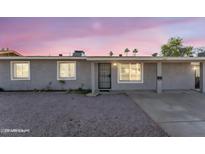Charming single-story home featuring a low-maintenance front yard and covered entryway at 1243 E Susan Ln, Tempe, AZ 85288