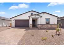 Charming single-story home with a two-car garage, desert landscaping, and a welcoming front entrance at 4811 W Hunter Trl, San Tan Valley, AZ 85144