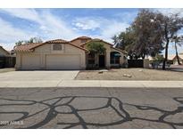 Charming single-story home with a three-car garage and well maintained landscaping at 3601 E Taro Ln, Phoenix, AZ 85050